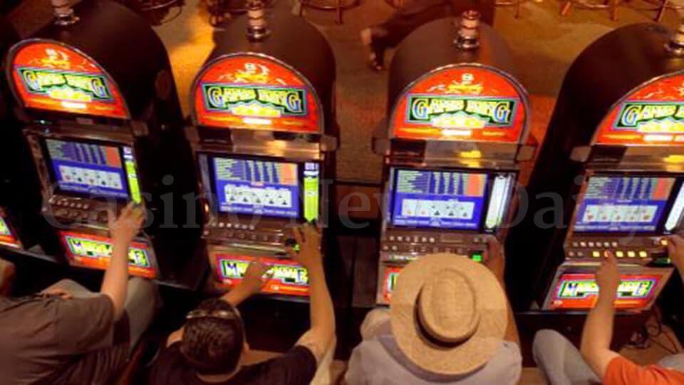 People Playing Video Poker